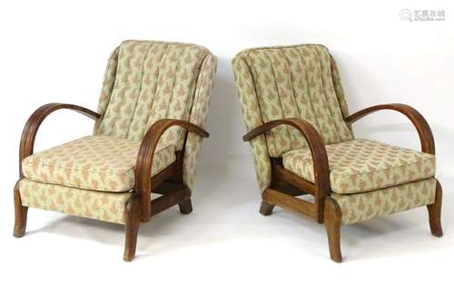 A pair of mid / late 20thC ‘Lazy chair’ open armchairs with curved armrests and adjustable seats.