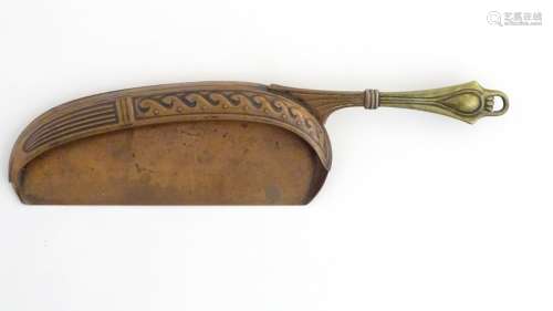 WMF : An early 20thC brass and copper embossed crumb scoop 12 1/2