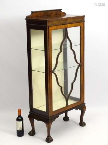 An early / mid 20thC flame mahogany glazed display cabinet,