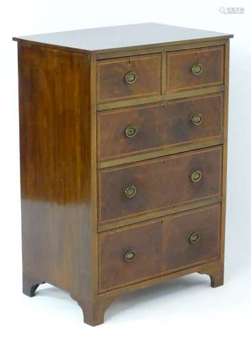 An early / mid 20thC mahogany chest of drawers of narrows proportions,