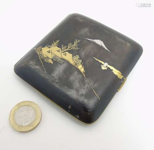 An early 20thC Japanese Amita hip formed cigarette case with damascene style decoration depicting