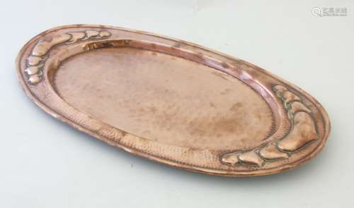 Art and Crafts Decorative metalware : An embossed and plannished large oval butlers tray with heart