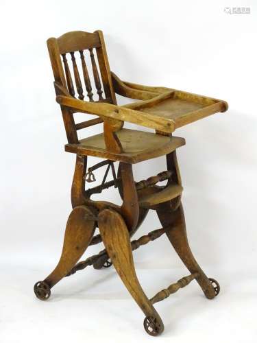 A late 19thC / early 20thC metamorphic childs chair with spindled backrest and adjustable eating