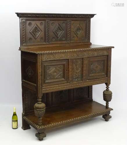 17 thC and later oak court cupboard , with panelled top section ,