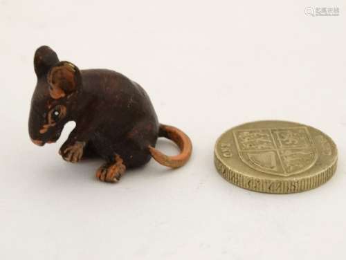 A 21stC cold painted bronze figure of a mouse.