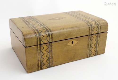 A 19thC semi dome walnut box with inlaid banded decoration.