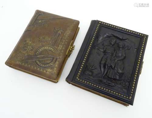 Two Victorian leather bound photo albums,