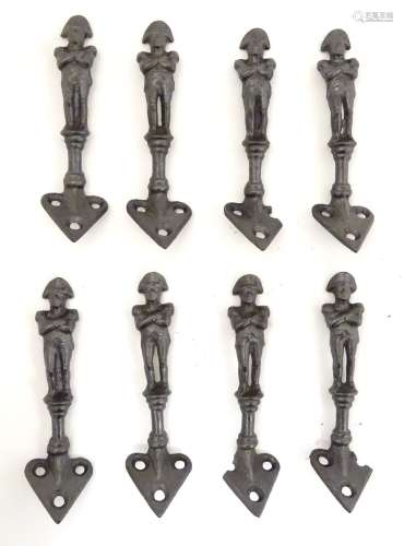 Militaria : A set of eight c1900 black - painted cast iron Coat Hooks ,