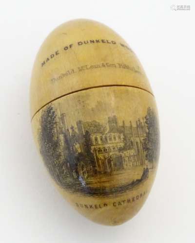 Advertising Mauchline ware : A Turned treen needlework thimble case of egg form,