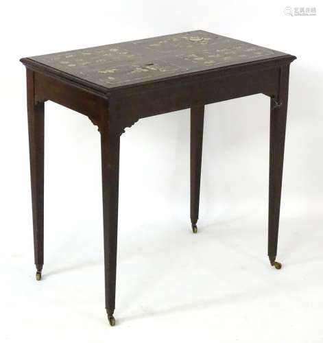 A mid 20thC Chinese style hardwood occasional table with mother of pearl inlay,