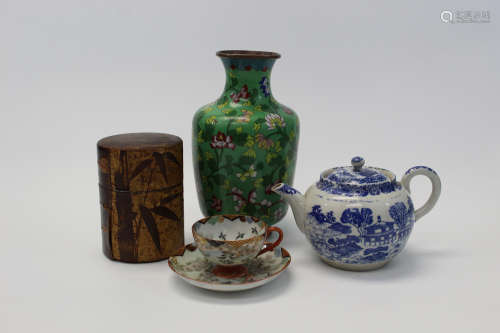 A group of Asian decorative items.