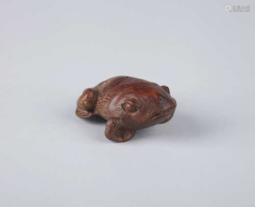 Chinese carved bamboo figure of a frog.