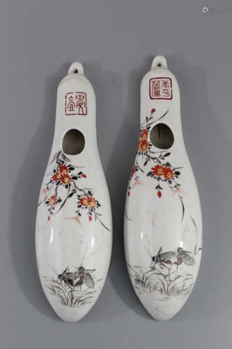 A pair of Japanese porcelain wall pockets.