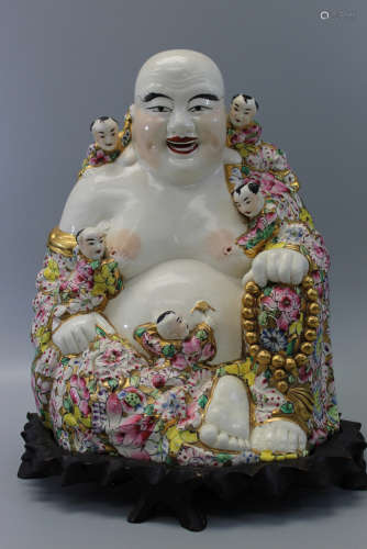 Chinese porcelain laughing Buddha with children statue.