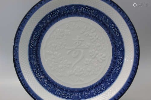 Japanese blue and white porcelain charger with carved