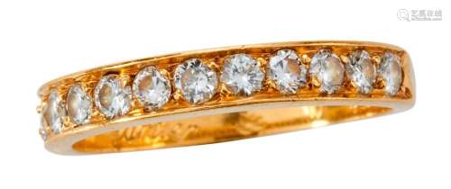 Yellow gold wedding ring set with 12 brilliant cut...
