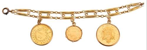 Yellow gold bracelet decorated with three gold coi...