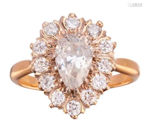 Yellow gold ring set with a pear shaped diamond we...