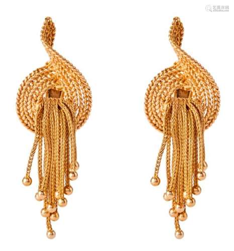 Yellow gold earrings holding multiple tassels ende...