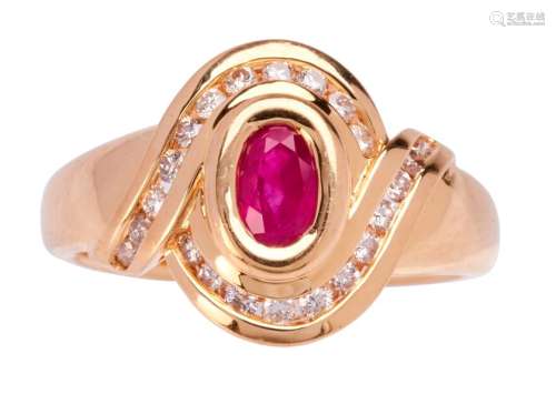Yellow gold ring set with an oval sapphire surroun...