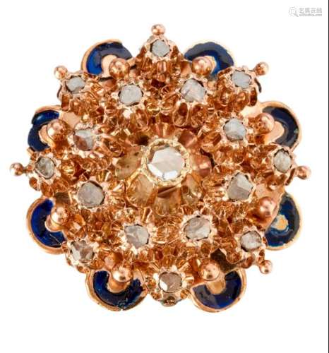 Yellow gold brooch representing a flower with a bl...