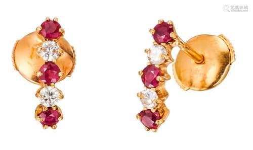 Yellow gold earrings decorated with diamonds and r...