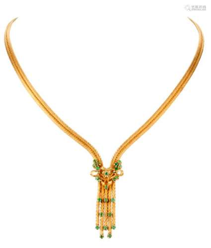 Yellow gold necklace decorated with small emeralds...