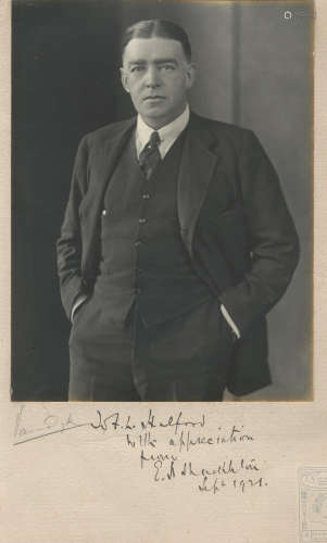 Three quarter length portrait photograph of E.H. Shakleton, INSCRIBED BY HIM 