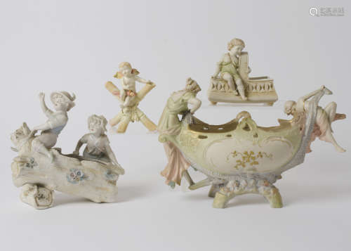 A Royal Vienna Wahliss figure of a child perched upon a basket, together with a selection of Italian