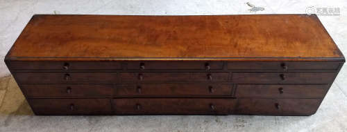 A 19th Century mahogany table top cabinet, 12 graduated drawers, 95 cm wide x 23 cm deep x 26 cm