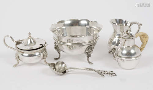 A selection of 20th century silver and silver plated tea set pieces, including two silver teaspoons,