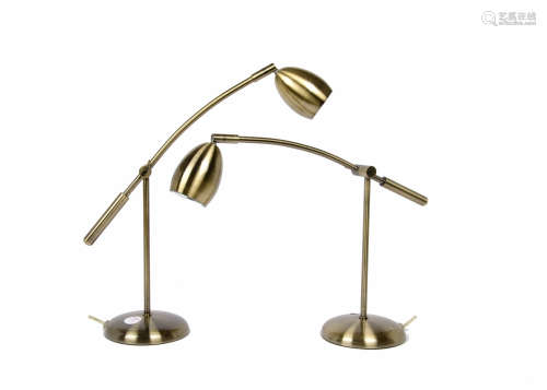 A pair of modern Scandinavian brass desk lamps, adjustable arms and heads, circular base (2)