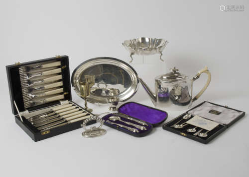 A collection of British silver, plates, bowls and cutlery including a Georgian teapot, London