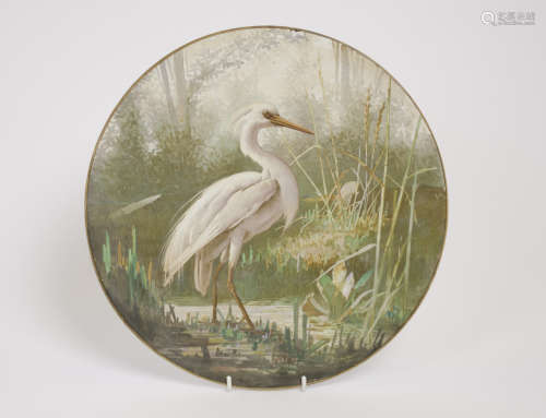 Georges Léonce painted heron on ceramic charger, signed 'G.LEONCE' (lower centre), stamped to