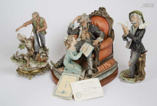 Three Italian Capodimonte figures, including the 'Young Storyteller' on a wooden stand, 'Surprised