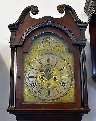 An 18th Century mahogany longcase clock by Richard Deeble Corke, broken pediment with rosettes,