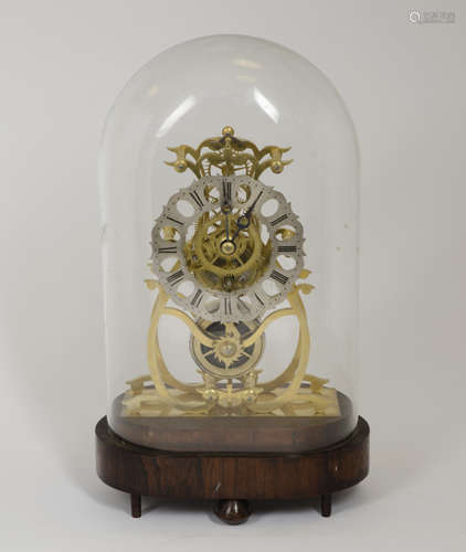 A 19th century brass skeleton clock, Roman dial with pierced decoration, single train fusee