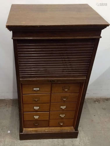 An early 20th Century oak tambour front file cabinet, 16 drawers, 62 cm wide x 48.5 cm deep x 115 cm