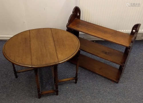 A small mahogany oval spider leg table, turned and squared supports, 66 cm wide x 52 cm deep x 47 cm