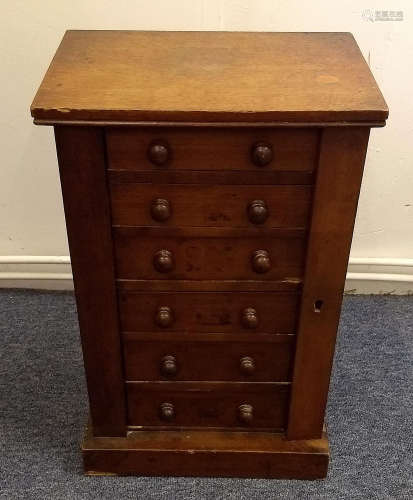 A miniature mahogany Wellington chest, six graduated drawers, 36 cm wide x 26 cm deep x 56 cm
