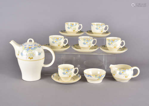 A Woods Ivory Ware Art Deco coffee set, Hassan pattern, six coffee cans and saucers, milk jug, sugar