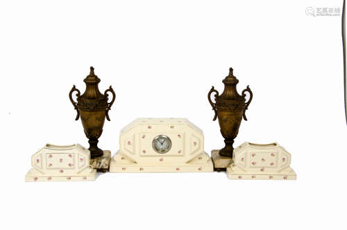 A 20th Century French ceramic clock garniture by Moulin des Loups & Hamage, circular dial, Roman