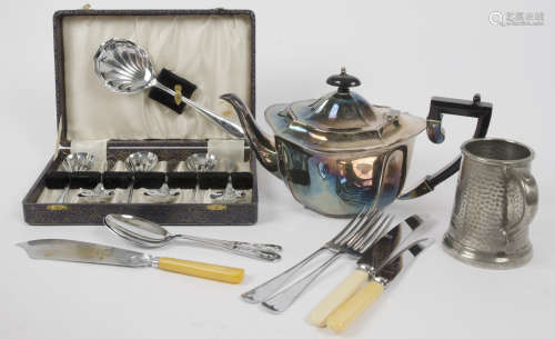 A collection of silver plate, including tea pot, coffee pot, milk jug, sugar bowl, revolving