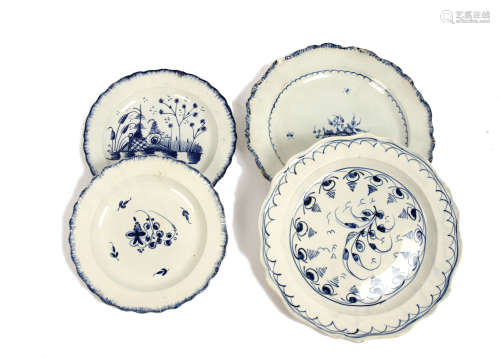 A collection of early English 18th century plates, hand painted in underglaze blue with floral