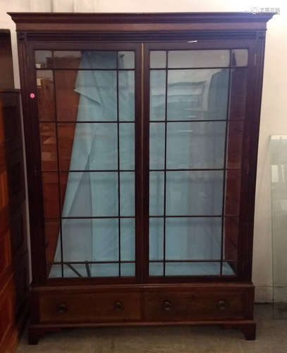 A 19th Century mahogany large two section glazed display cabinet, two glazed panel doors revealing