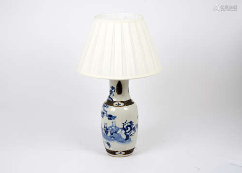 A Chinese porcelain blue and white painted lamp, decorated with applied bronze decoration and