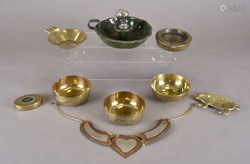 A small quantity of metalware, including four Middle-Eastern brass bowls, a silver plated model of a
