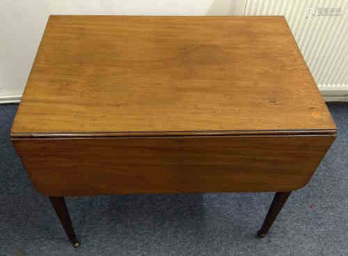 A 19th Century mahogany Pembroke table, squared tapered supports and casters, 112 cm wide x 85 cm