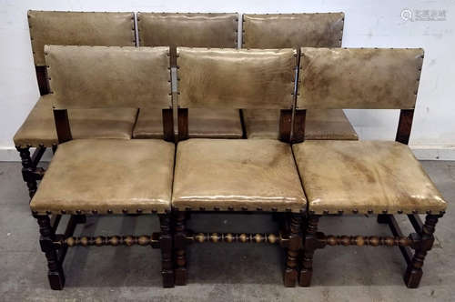 A set of six late 19th Century oak and studded leather dining chairs, barley twist front supports