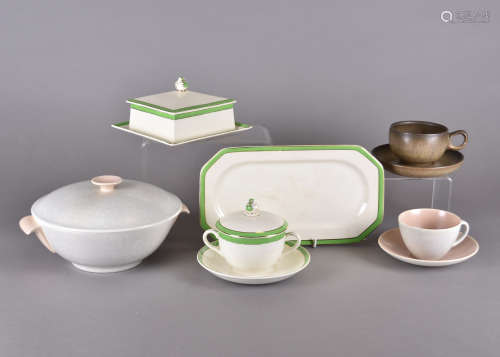 A collection of Poole pottery two tone dinner services, in pink and grey, together various coffee